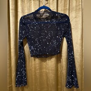 Star covered, sparkly, mesh, long sleeve crop top